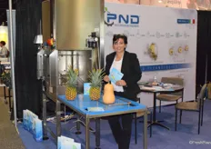 Virginia Cascella from PND with their peeling machine especially for melons, butternut squash and pineapples